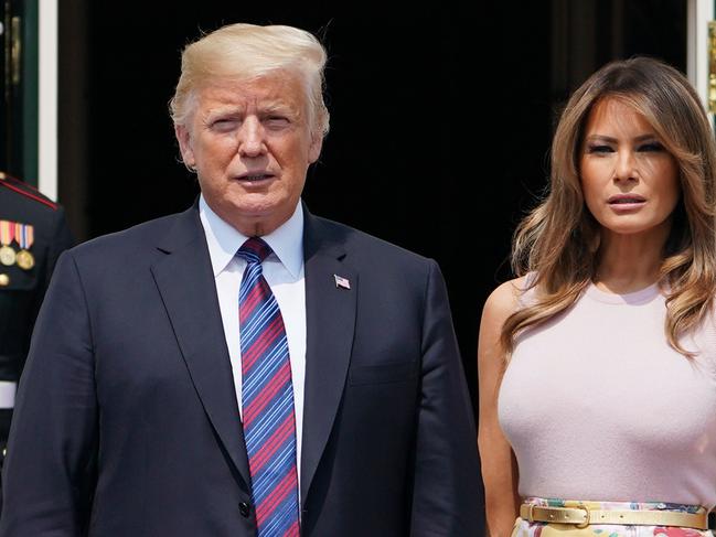 US President Donald Trump and First Lady Melania Trump, meet with the president of Kenya, President Uhuru Kenyatta and his wife Margaret Kenyatta in the Oval Office of the White House on August 27, 2018 in Washington,DC. (Photo by MANDEL NGAN / AFP)