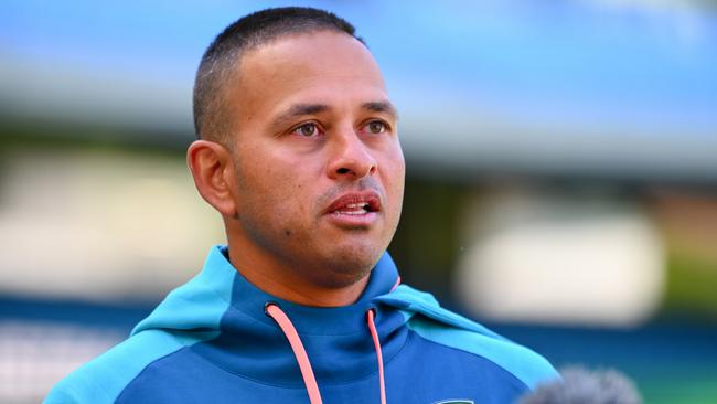 Usman Khawaja faces the media at the MCG on Friday after he was reprimanded by the ICC for wearing a black armband in Perth. Picture: Getty Images