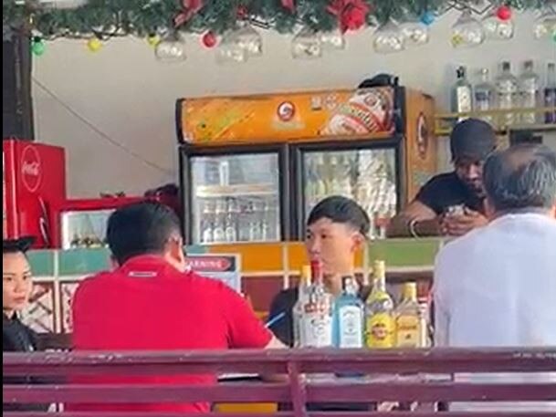 Laos Police interrogate the staff at the backpackers.