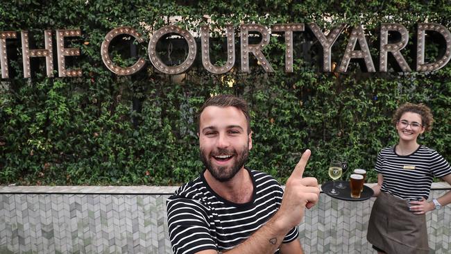 Staff James Magro and Lily Xiberras celebrate after The Fiddler was named Sydney’s best. Picture: Carmela Roche