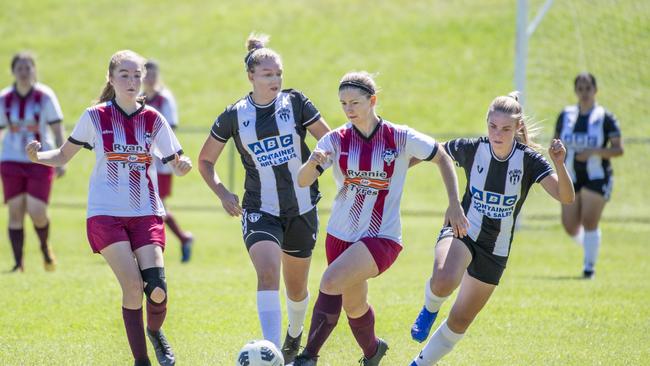 Maegan Campbell, Warwick and Courtney Morris, Willowburn. Willowburn FC vs Warwick Wolves, 2021 TFL - Premier Ladies. Sunday, April 11, 2021. Picture: Nev Madsen.