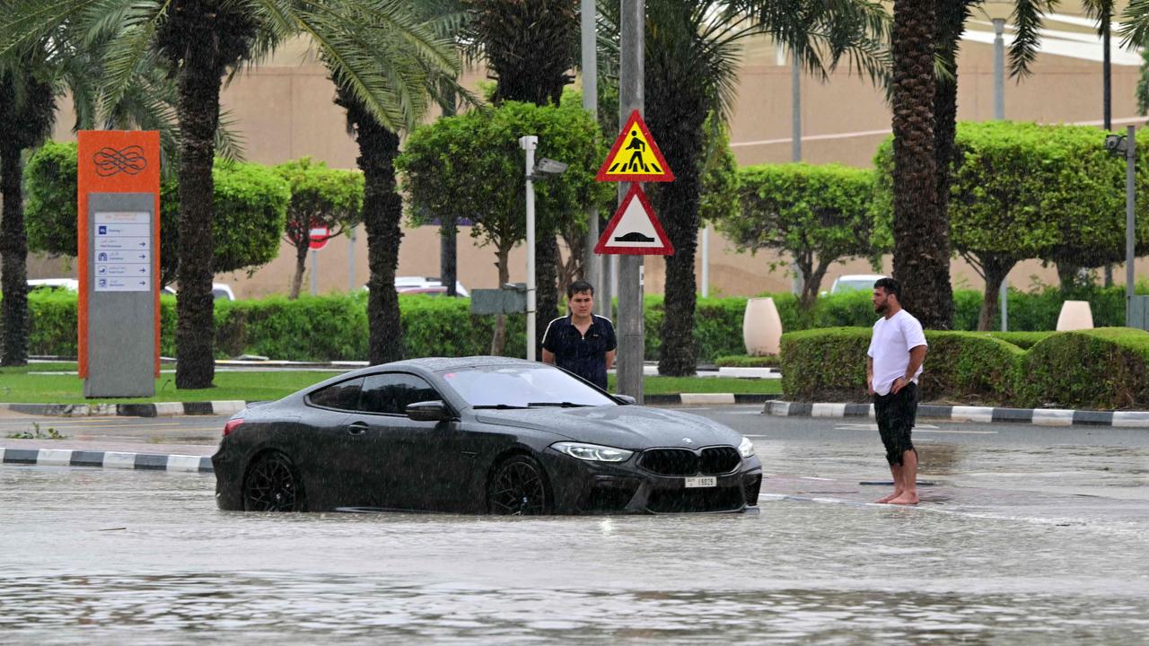 Another car is seen stranded on a flooded street in Dubai on May 2. Picture: Giuseppe Cacace / AFP