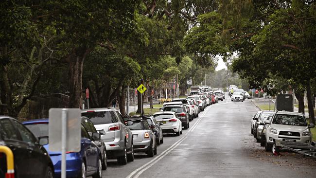 Large lines of people in their cars waiting to get tested at Manly Hospital drive in COVID-19 testing clinic with wait times up to 5 hours on the 20th of December. Picture: Adam Yip