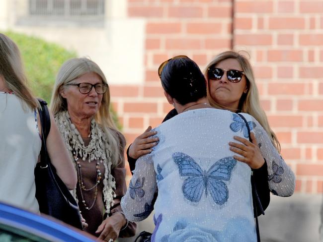 There were emotional scenes outside St John’s. Picture: AAP