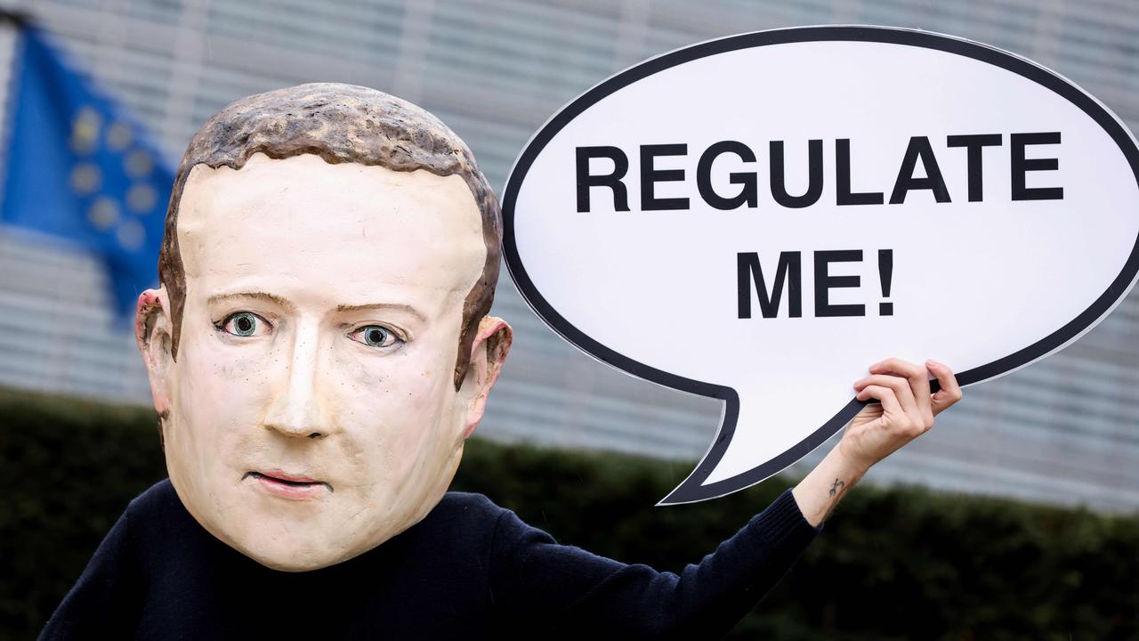 An activist protesting Facebook outside the European Commission building in Brussels. Picture: Kenzo TRIBOUILLARD / AFP