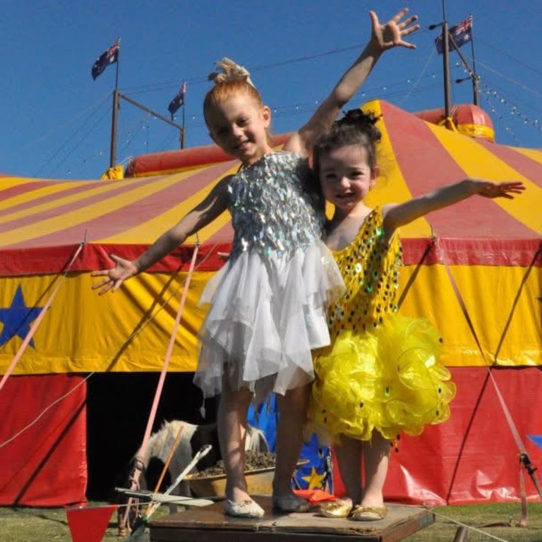 Stardust Circus performers Shakira West, left, aged four, with Talira West-Smith, two, ready for the finale at Goulburn, regional NSW, in 2010. Picture: supplied