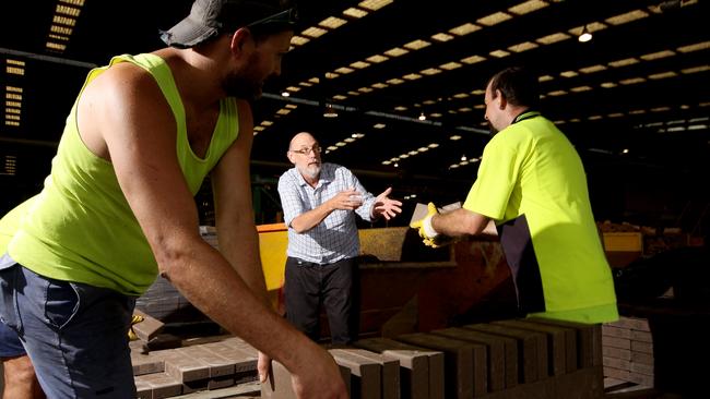 Claypave staff at the company&#39;s New Chum facility. 