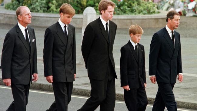 Prince Philip, Prince William, Earl Spencer, Prince Harry and Prince Charles walk behind the coffin during Princess Diana’s funeral. Picture: AFP Photo/Jeff J Mitchell