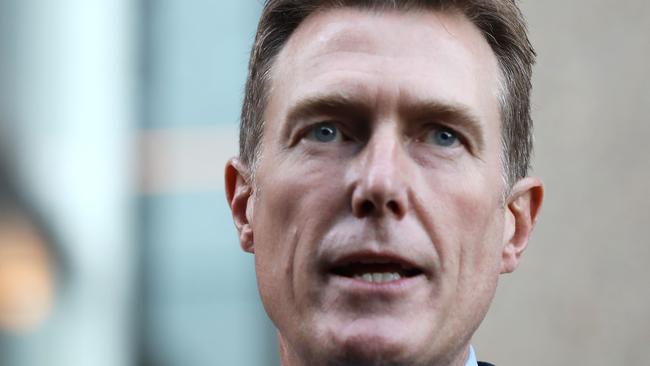 Christian Porter speaking at a press conference outside the Supreme Court after dropping his claims against the ABC for deformation. Jane Dempster/The Australian.