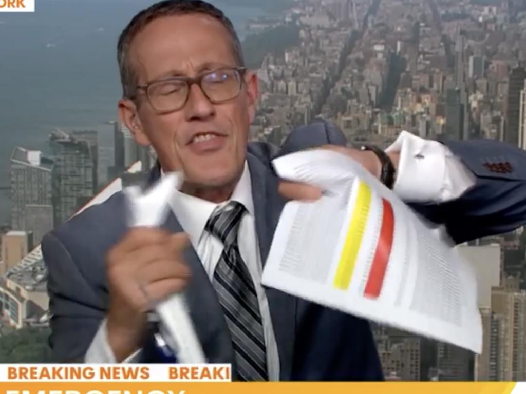 CNN correspondent Richard Quest produced a series of props during the interview.