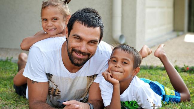 Hezron Murgha with children Dante 4 and Amaziah 7 upon his signing with the Cowboys in 2013.