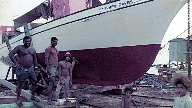 MV Stephen Davies' skipper Fred Mills and crew pose for a photo in front of the lugger on the slipway at Thursday Island, circa 1960. Picture: Zafer family image collection