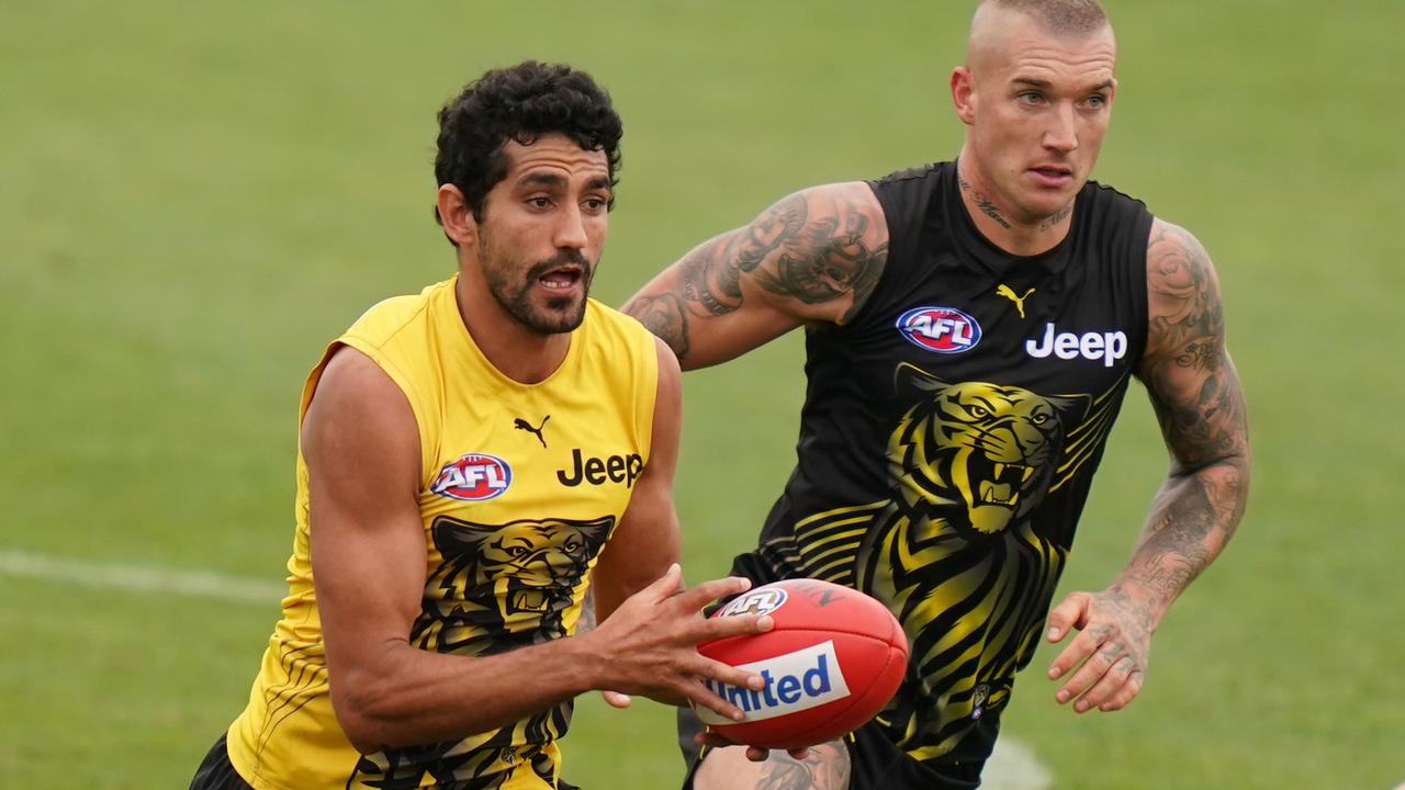 Marlion Pickett breaks away from teammate Dustin Martin during the Tigers’ intra-club match. Picture: Scott Barbour/AAP