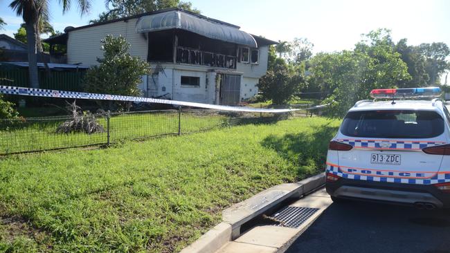 Police are guarding the Pimlico house gutted by fire. Photo: Keagan Elder