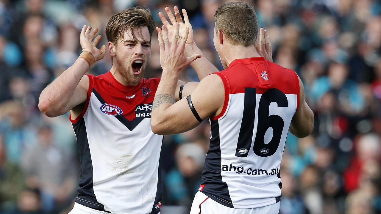 AFL - Port Adelaide v Melbourne at Adelaide Oval. Dom tyson celebrates his goal with dean Kent. Photo Sarah Reed.