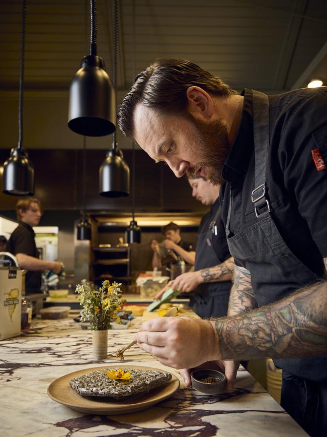 Justin James creates the edible apple puree flower. Picture: Matt Loxton