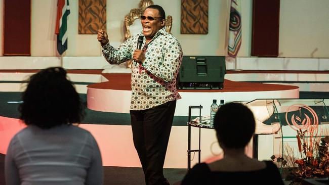 King Somnala, head of the Nala Mandate Church, prays with worshippers under the theme “Prayer of Divine Restraining Order Against Corona Virus” in Durba. Picture: AFP.