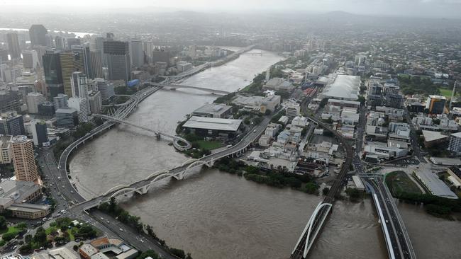 The swollen Brisbane river snakes around the Brisbane CBD Wednesday, Jan. 12, 2011.