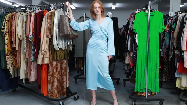 Sadie Wyer-Manock models one of the classic second-hand dresses for sale at The Turn HQ in Punchbowl in Sydney’s southwest. Picture: John Feder