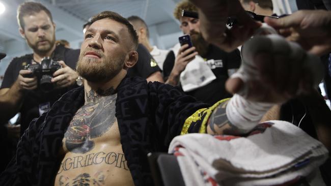 Conor McGregor has his hands wrapped before a workout in front of the media.