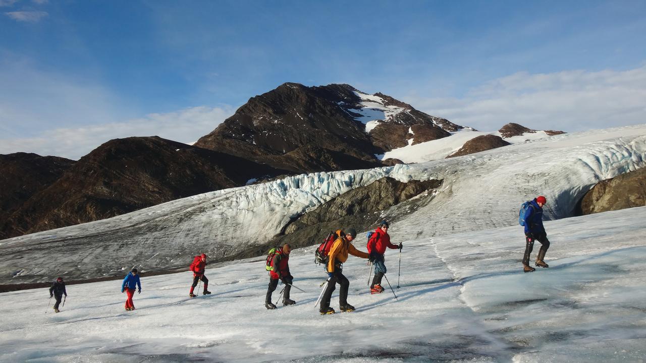 Teams crossing the Fortuna Glacier. Picture: Tarn Pilkington/Aurora Expeditions