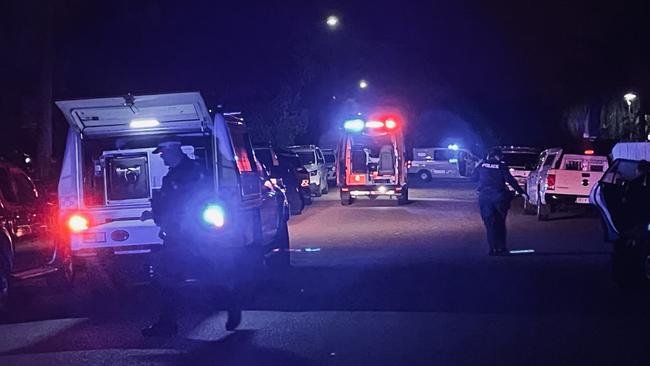 Police and ambulance crews outside a residence at Eleventh Ave, Railway Estate following reports a man had been stabbed. Picture: Blair Jackson