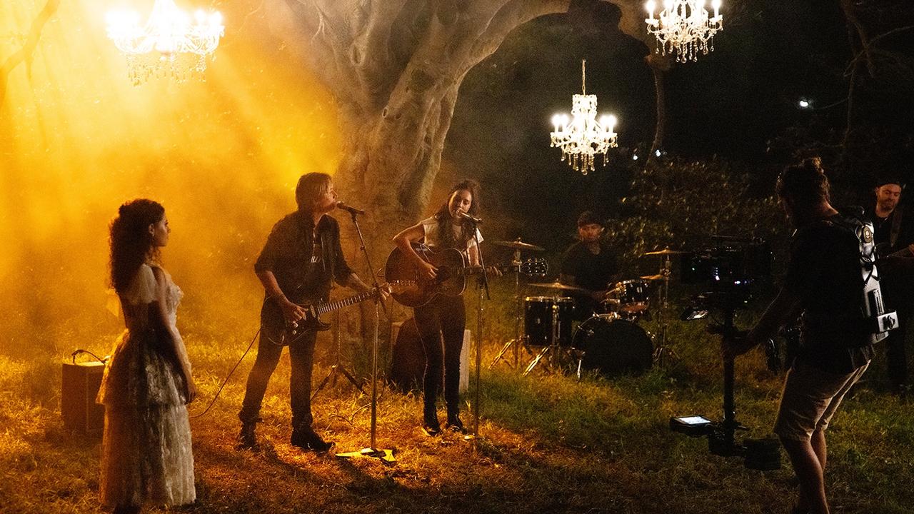 Behind the scenes of Amy Shark's new music video with Keith Urban in Centennial Park in Sydney for their duet Love Songs Ain't For Us. Picture: Supplied/Sony