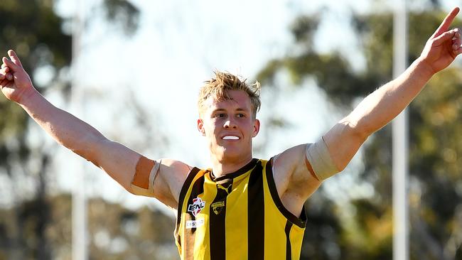 Kurtis Flakemore of Rowville celebrates kicking a goal. (Photo by Josh Chadwick)