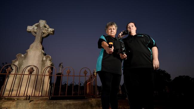 Karina Looby and Anne Hayes from Paranormal Investigators Townsville at the West End Cemetery. Picture: Evan Morgan