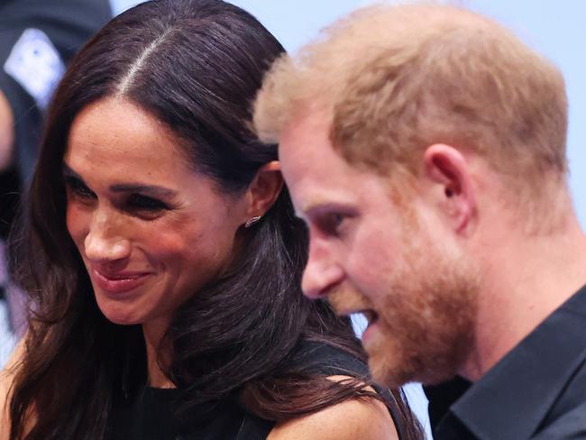 DUESSELDORF, GERMANY - SEPTEMBER 13: Prince Harry, Duke of Sussex and Meghan, Duchess of Sussex attend the Mixed Team Wheelchair Basketball Medal Ceremony during day four of the Invictus Games DÃÂ¼sseldorf 2023 on September 13, 2023 in Duesseldorf, Germany. (Photo by Joern Pollex/Getty Images for Invictus Games DÃÂ¼sseldorf 2023)