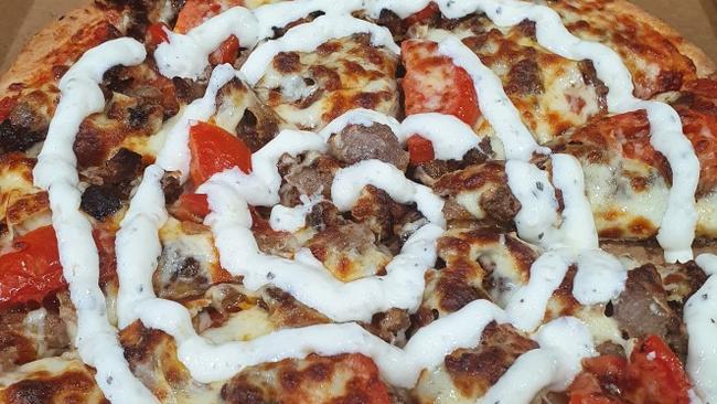 The Yummy Pizza team says its lamb souvlaki pizza is unbeatable. Picture: Supplied