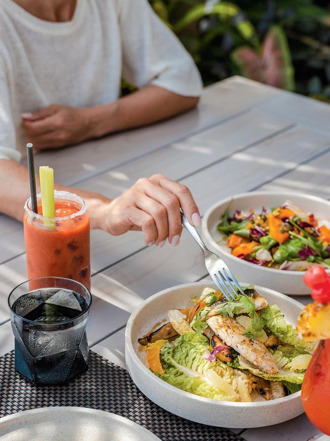 Pan-seared fish, pumpkin salad and a Bloody Mary at the newly opened Beach Grill. Picture: James Vodicka