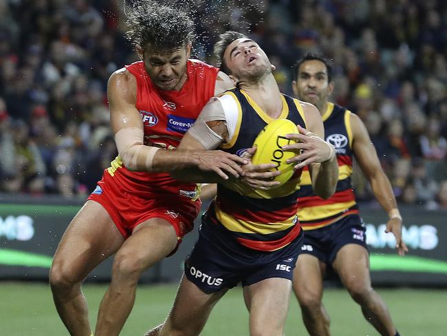 The last time the Crows played the Gold Coast Sun, small forward Lachlan Murphy felt the full force of a hit from Jarrod Harbrow. Picture: SARAH REED