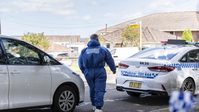 Forensic services photographed at Simmat Ave, Condell Park, after Mejid Hamzy was shot. Picture: Monique Harmer