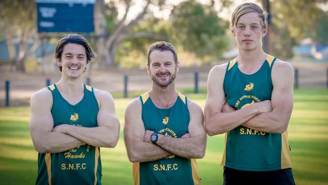 Salisbury North coach Gavin Chaplin (middle) with players Jordan Boyle and Jake Russo before the start of the season. Picture: AAP/Roy Vandervegt.