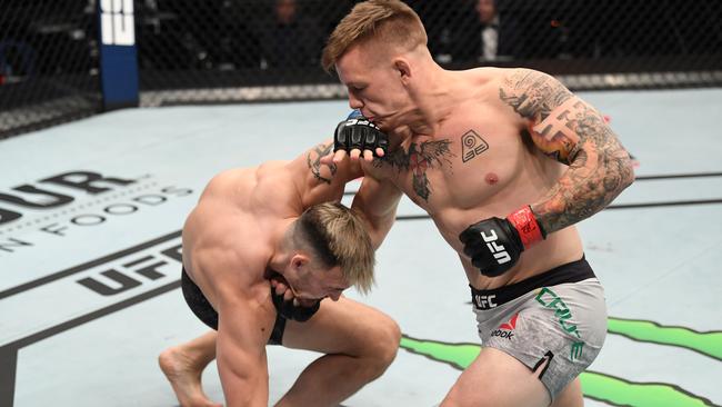 Jimmy Crute unleashes on Modestas Bukauskas at the UFC Fight Night in Abu Dhabi last year. Picture: Josh Hedges/Getty Images