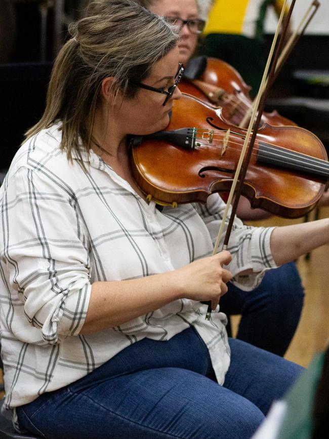 Nikkita Castles returned to the viola for the anniversary performance.