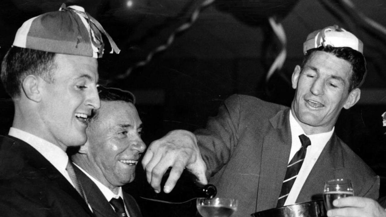 John Raper (left) and Norm Provan celebrate the Dragons’ 1961 grand final win. Picture: Winton Irving