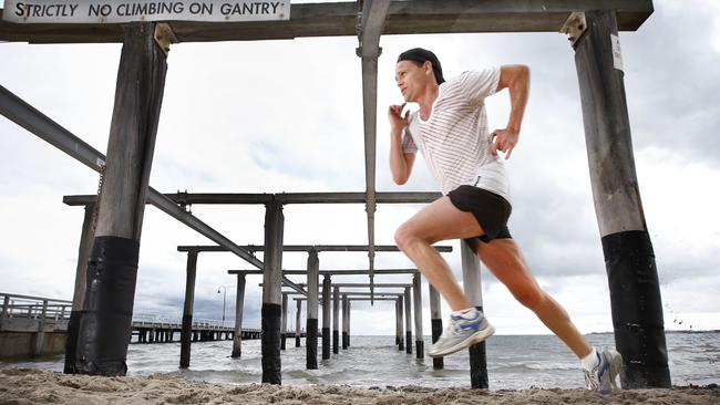 Danny Nikolic trains on the beach to keep fit while waiting to return to racing. Picture: David Caird.