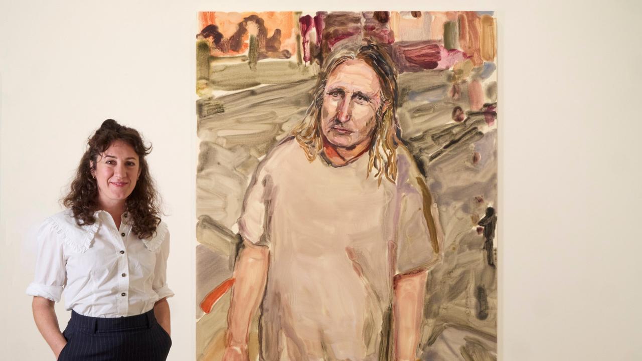 Archibald Prize 2024 winner Laura Jones with her work Tim Winton. Picture: NewsWire /Supplied