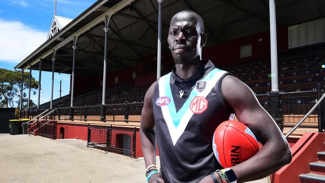 Aliir Aliir in front of the Fos Williams grandstand at Alberton Oval on Wednesday. Picture: Mark Brake