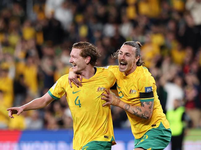 Kye Rowles of Australia celebrates scoring a goal with Jackson Irvine of the Socceroos during the FIFA World Cup 2026 Qualifier match between Australia Socceroos and Lebanon at CommBank Stadium.