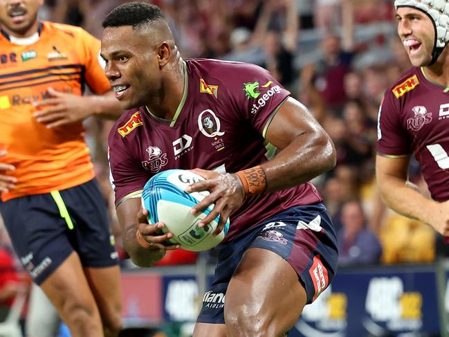 BRISBANE, AUSTRALIA - APRIL 02: Filipo Daugunu of the Reds scores a try during the round seven Super Rugby Pacific match between the Queensland Reds and the ACT Brumbies at Suncorp Stadium on April 02, 2022 in Brisbane, Australia. (Photo by Albert Perez/Getty Images)