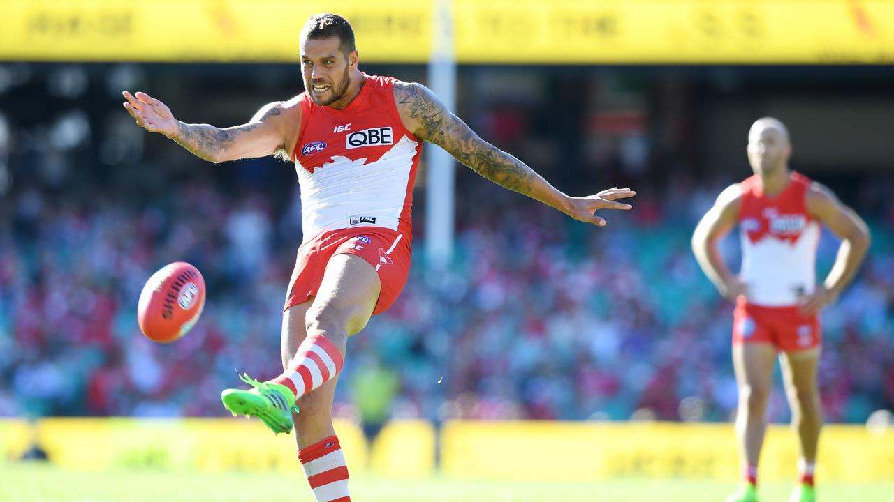 Lance Franklin has a shot on goal.