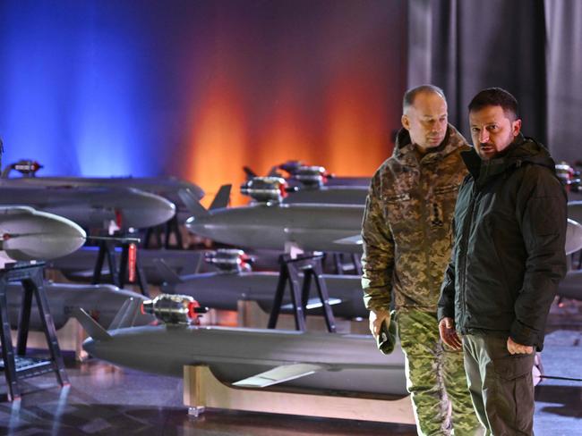 Ukrainian President Volodymyr Zelenskyy and Commander-in-Chief of the Armed Forces of Ukraine Oleksandr Syrsky with the first batch of Ukrainian made drone missiles. Picture: AFP