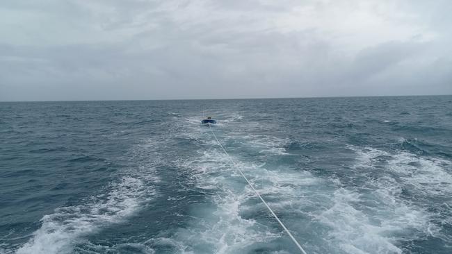 Two Aussie fishermen have been rescued from two-metre seas by Australian Border Force officers after their dinghy’s engine broke down in the Torres Strait.