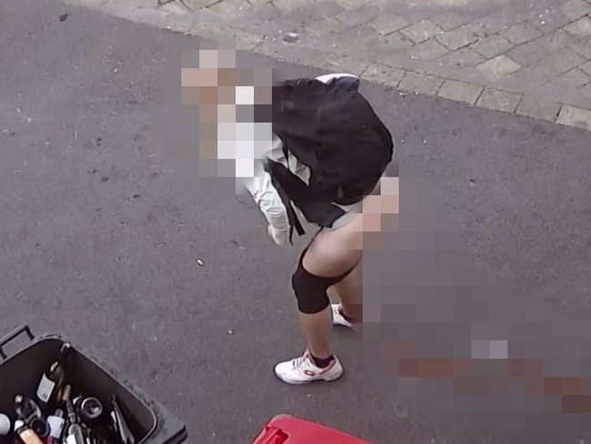 The woman caught defecating outside Porter’s Liquor in Pyrmont. Picture: CCTV