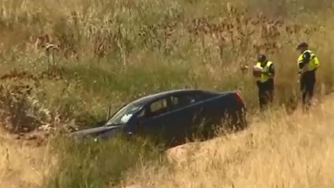 The car ended up in a ditch at Kingsford. Screengrab: 7NEWS