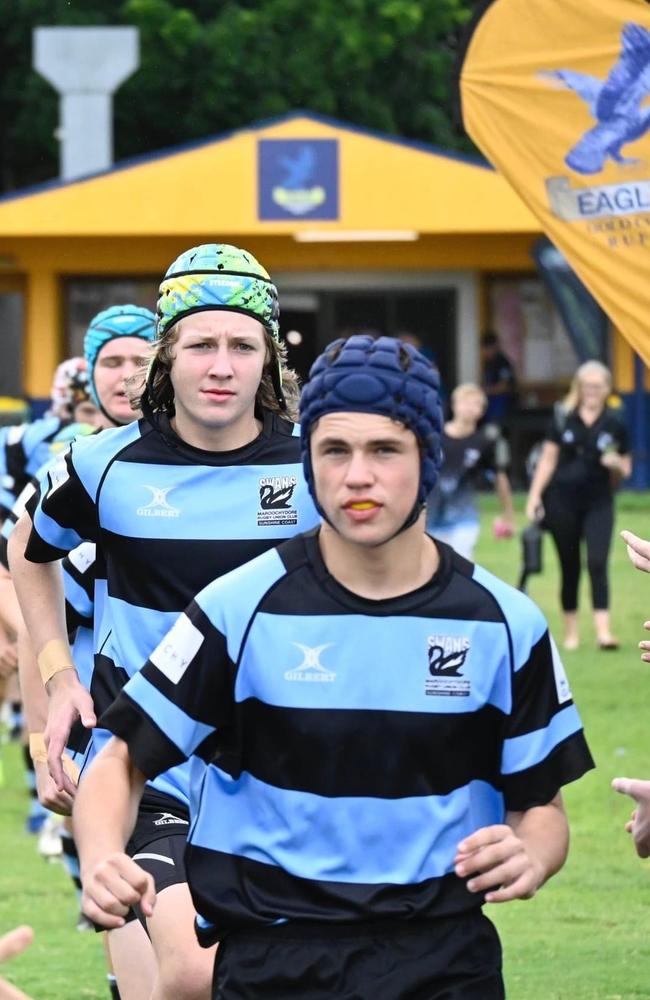 Maroochydore Swans captain Will Graham leads his team out at the 2022 King of the Country rugby union tournament.