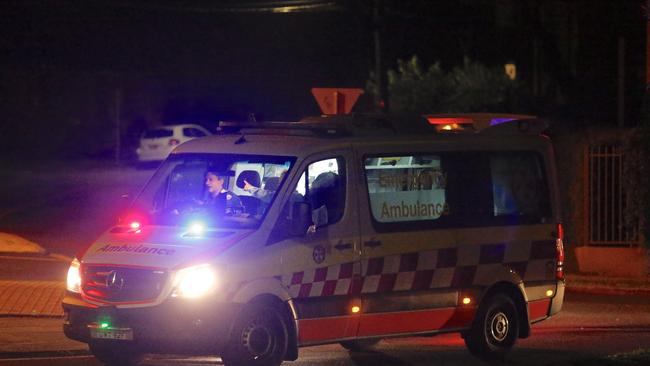 An ambulance at the scene. Picture: Steve Tyson